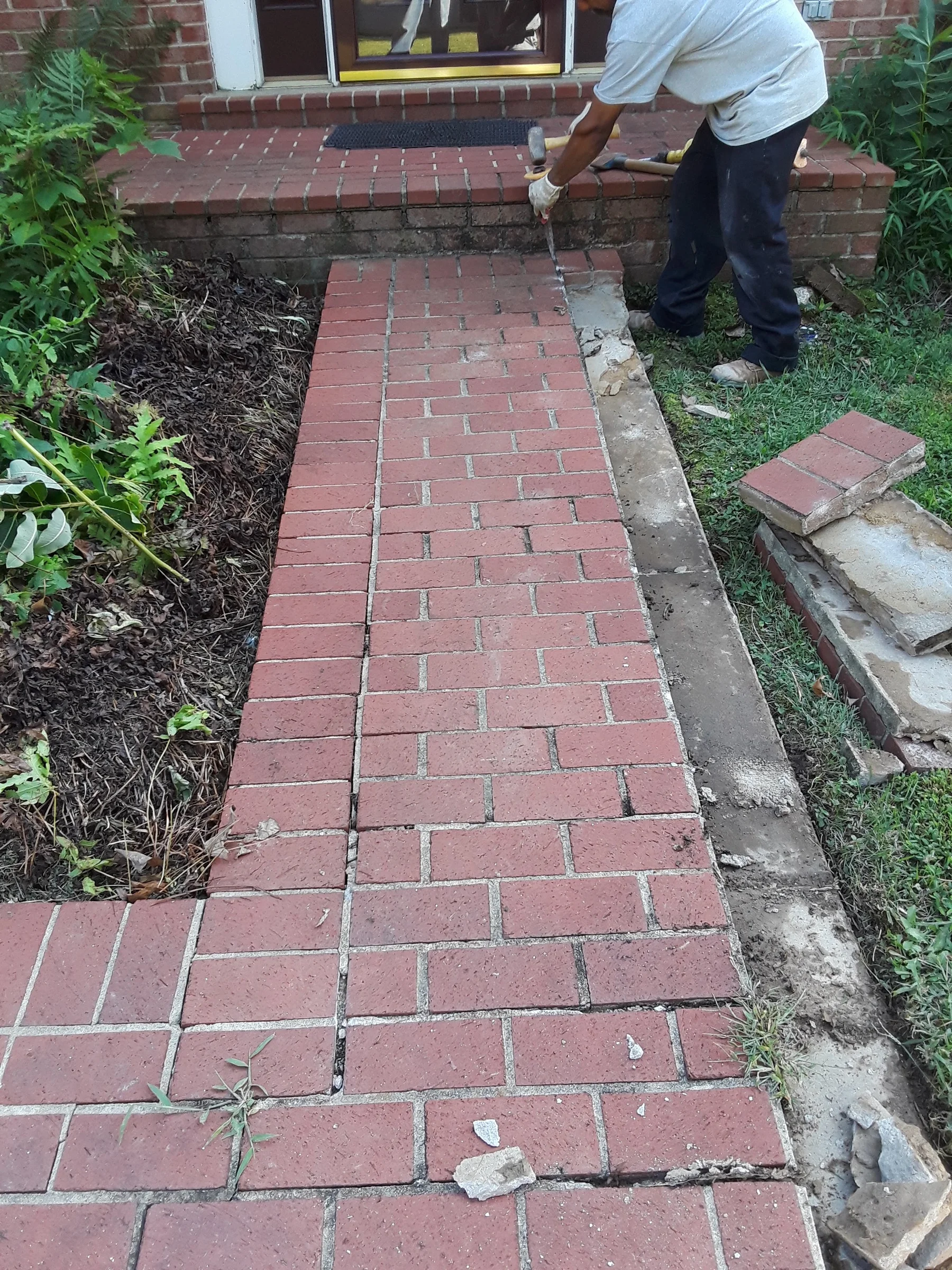 Brick walkway renovation in progress