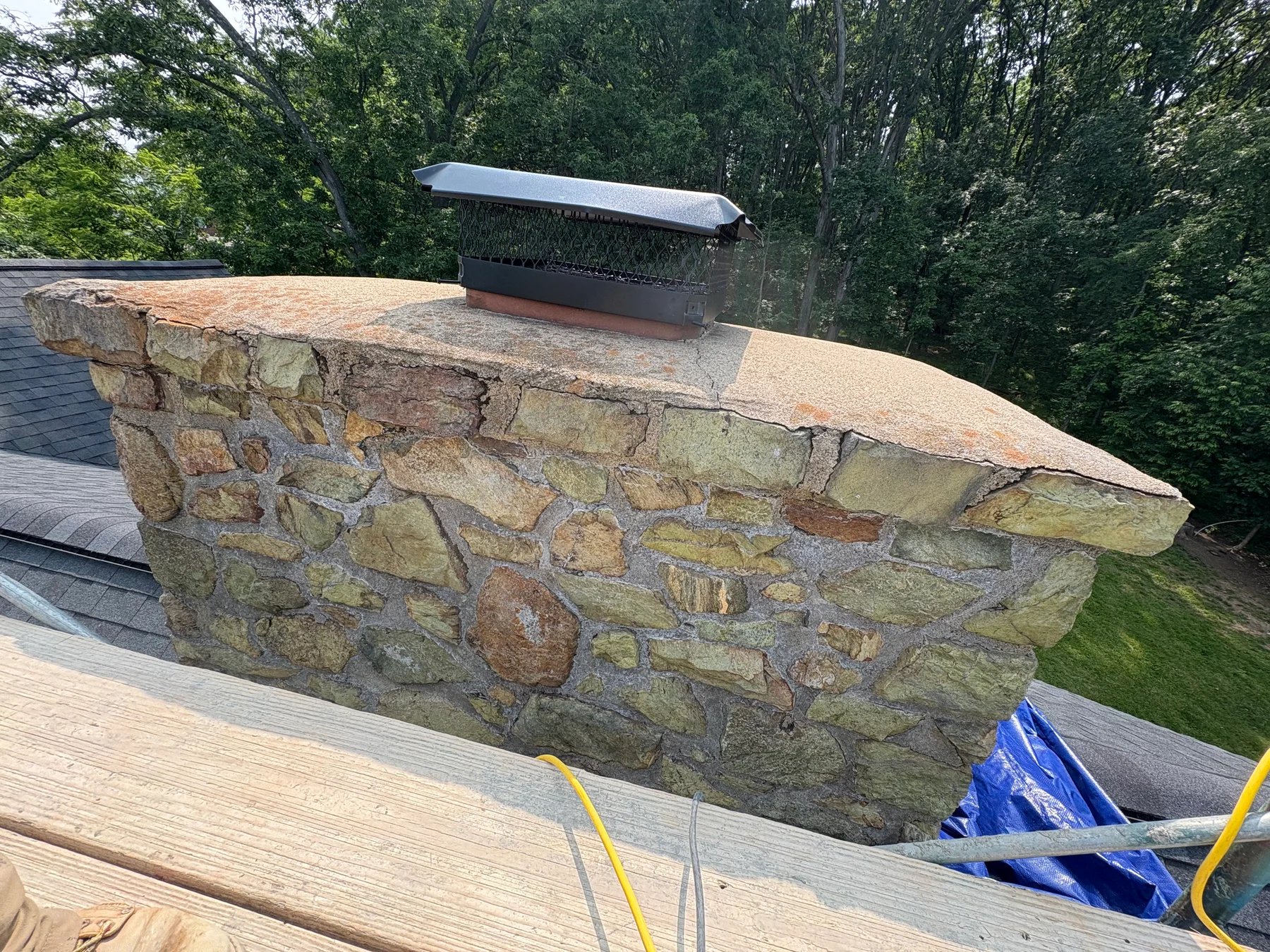 Stone chimney cap repair