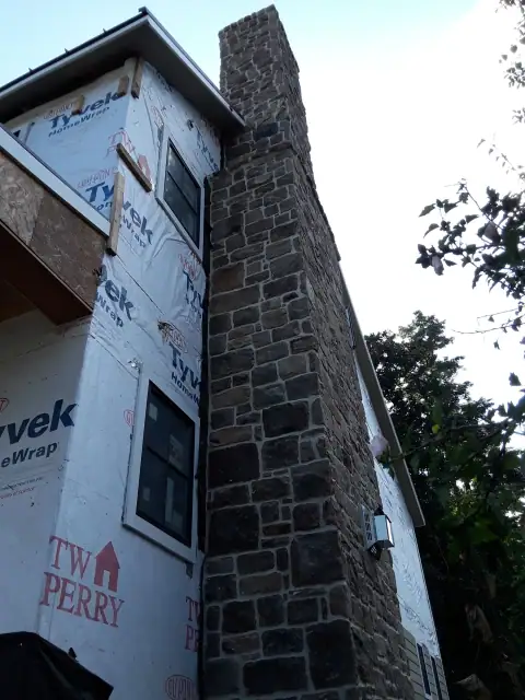 Chimney construction or repair in progress by F. Stone Designs