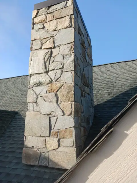 Chimney construction or repair in progress by F. Stone Designs