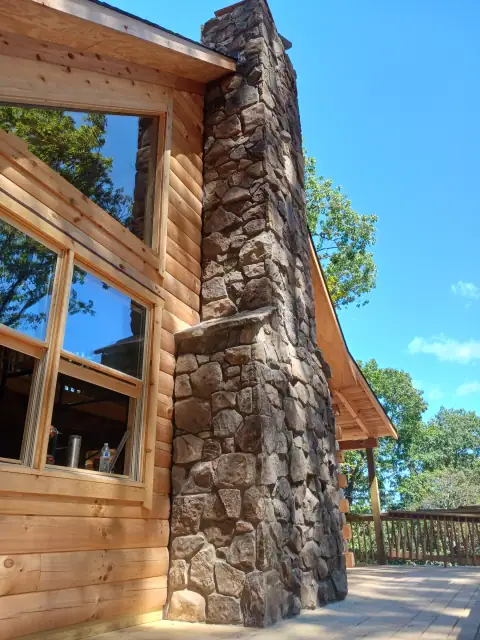 Chimney construction or repair in progress by F. Stone Designs