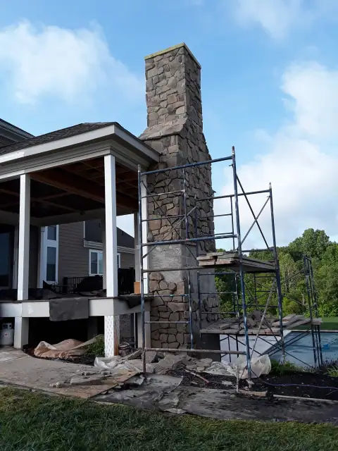 Chimney construction or repair in progress by F. Stone Designs
