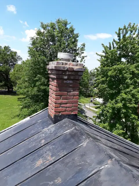 Chimney repair with scaffolding