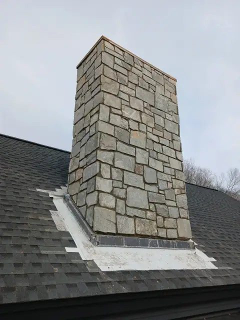 Stone chimney masonry by F. Stone Designs