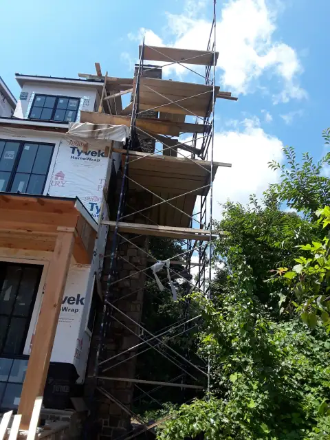 Chimney construction or repair in progress by F. Stone Designs