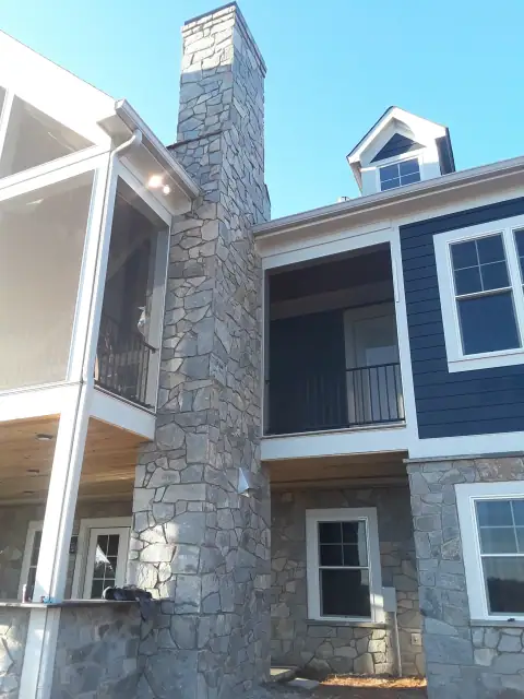Stone chimney masonry by F. Stone Designs