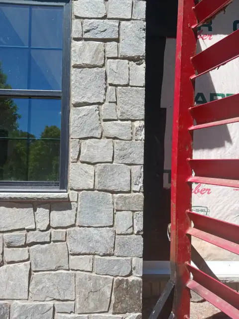 Cut stone detail around an exterior window