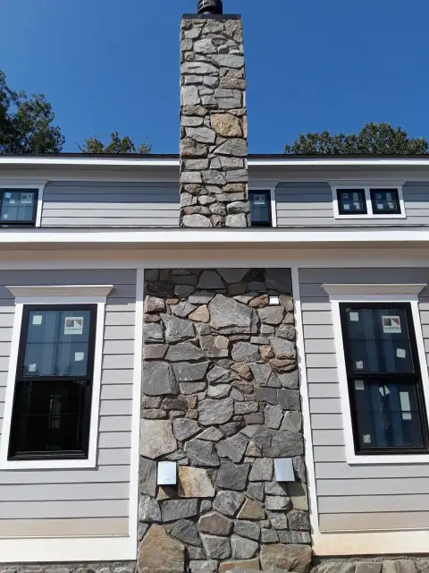 Stone chimney masonry by F. Stone Designs