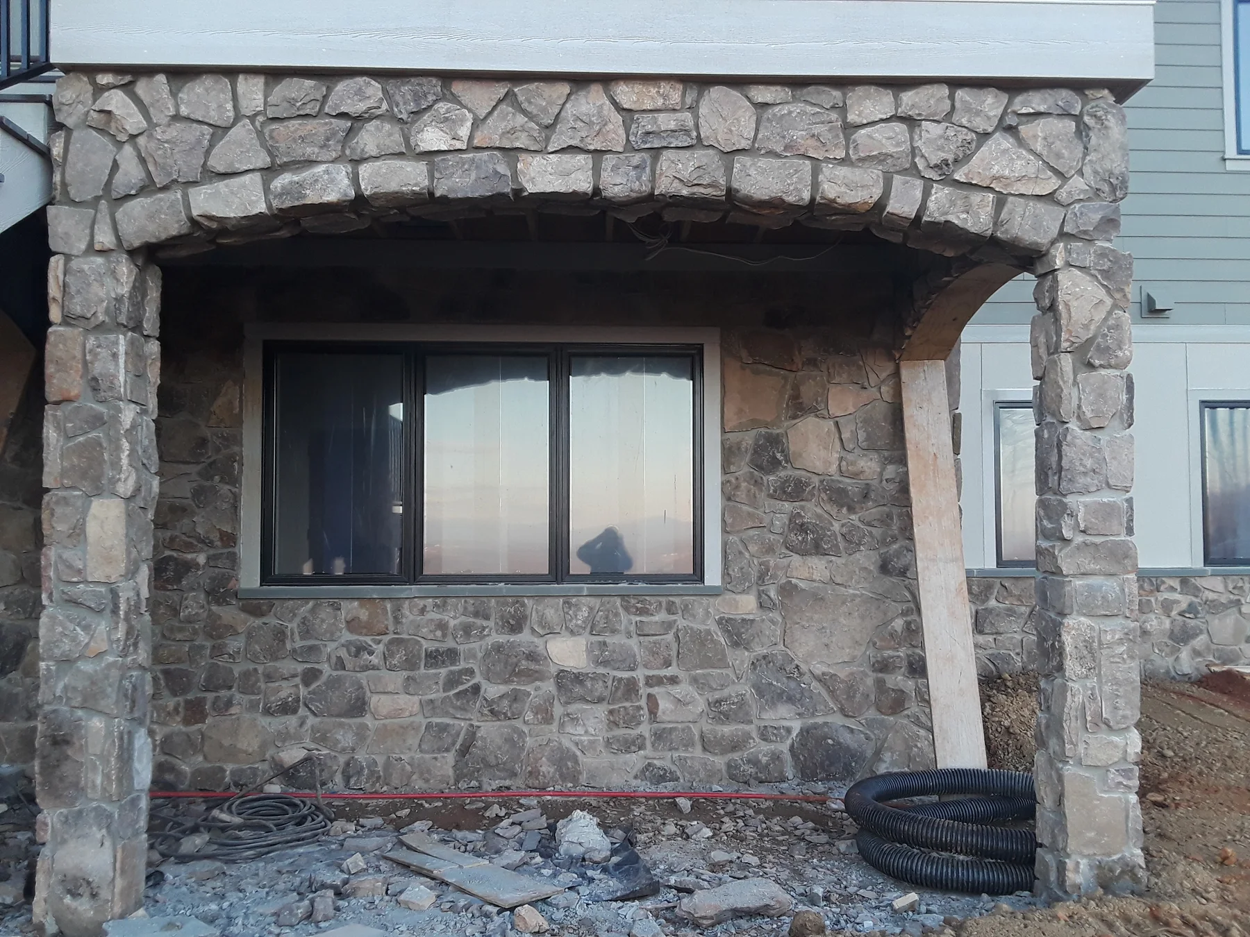Stone arch and masonry around a window