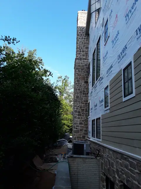 Stone chimney masonry by F. Stone Designs