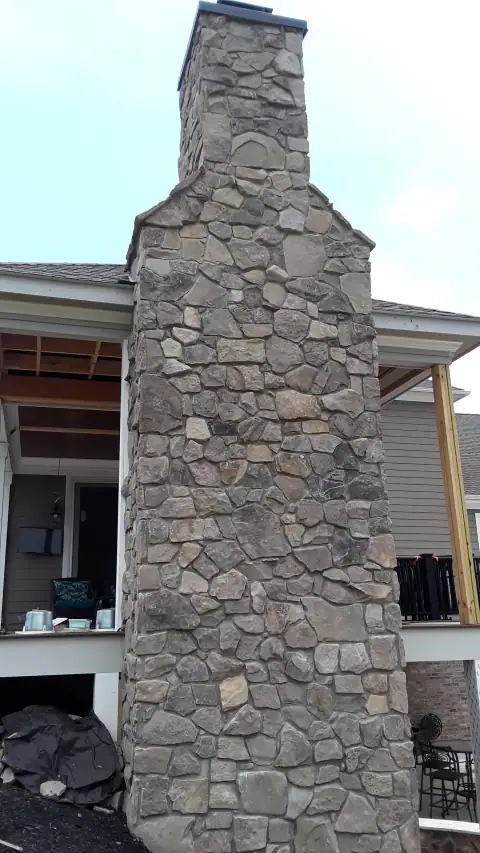 Stone chimney masonry by F. Stone Designs