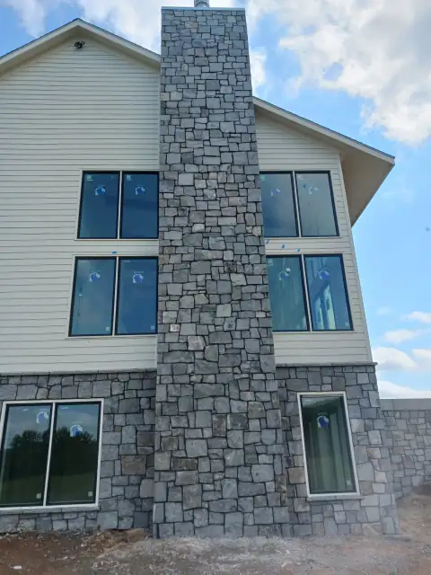 Stone chimney masonry by F. Stone Designs