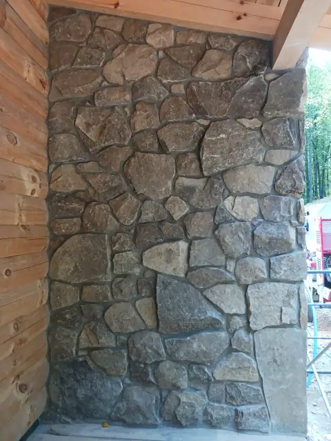 Rustic stonework on a porch wall
