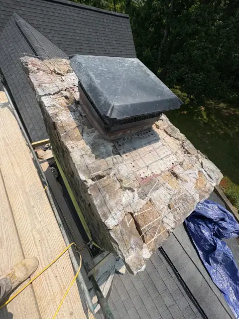 Chimney cap repair in progress