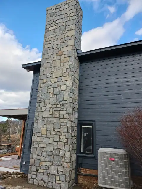 Stone chimney masonry by F. Stone Designs