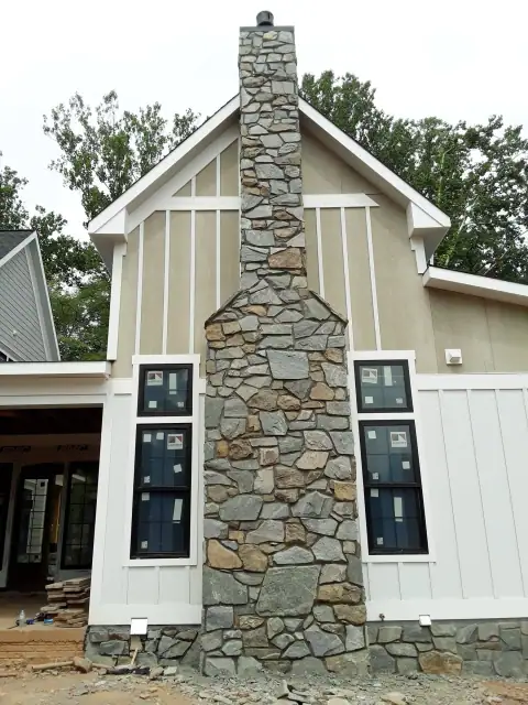 Stone chimney masonry by F. Stone Designs