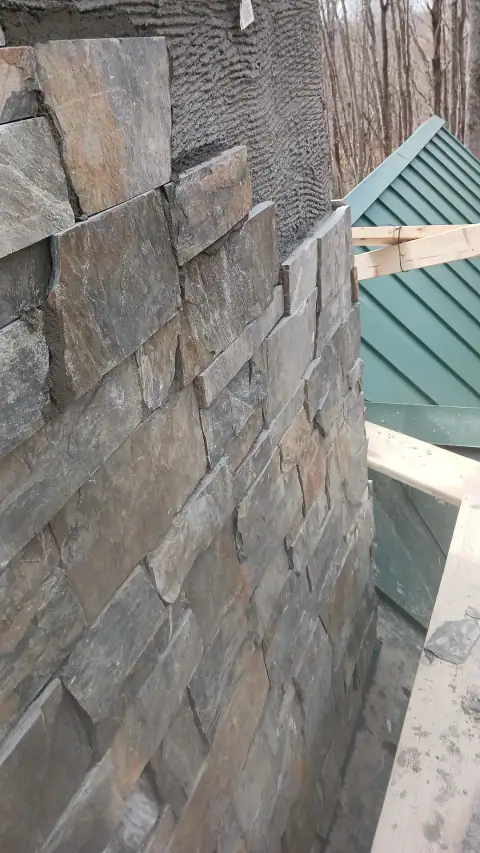 Chimney construction or repair in progress by F. Stone Designs